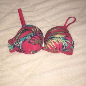 Red Victoria’s Secret Pink bra with leafy pattern